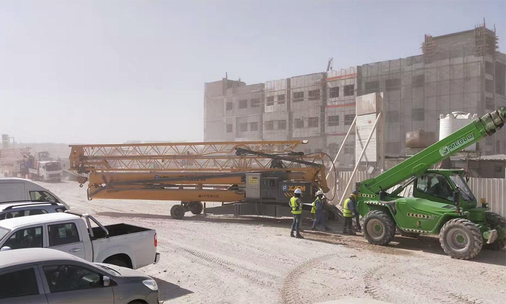 Small self-erecting tower crane – construction site in South Africa